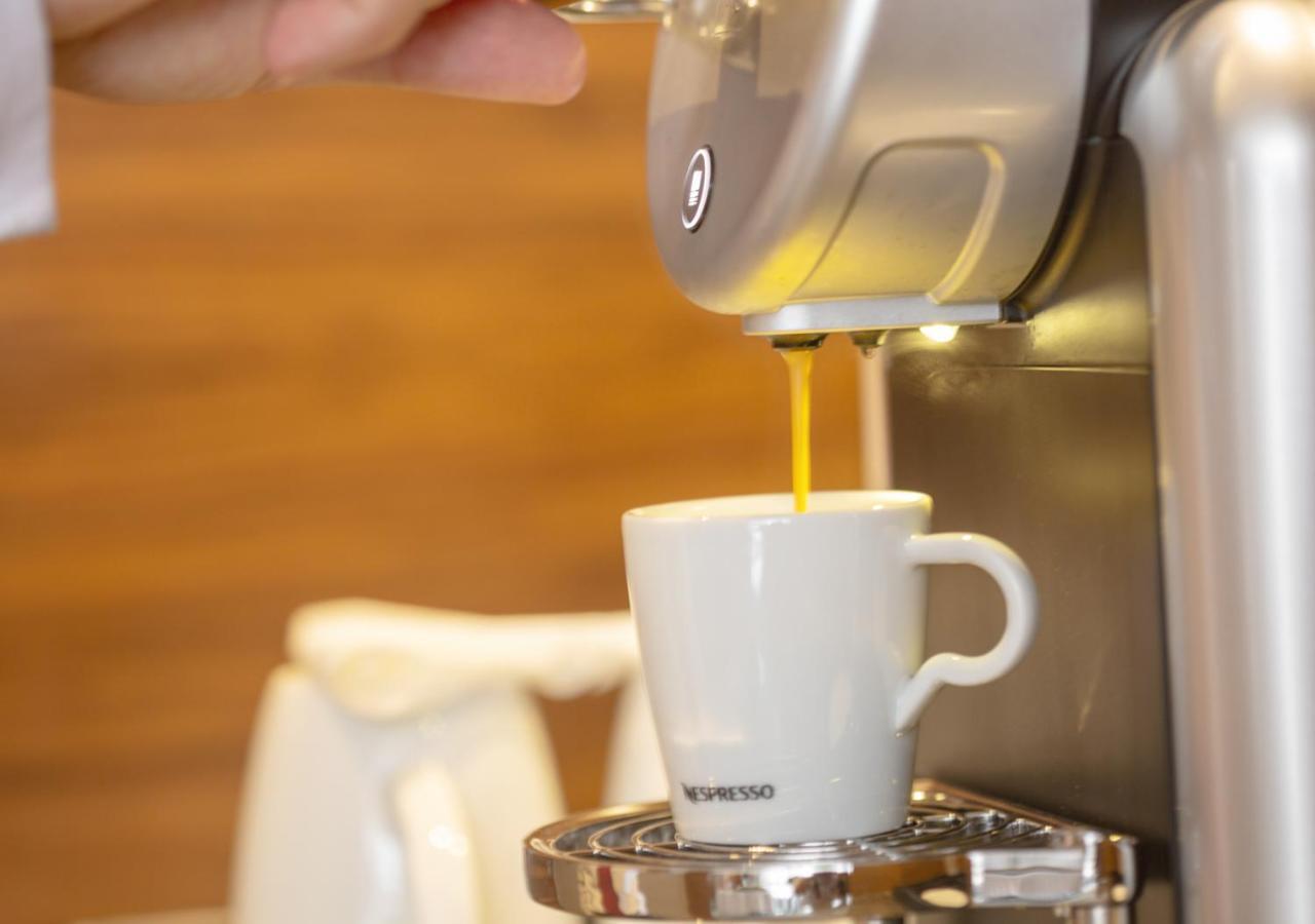 Al Safwah Orchid Hotel La Mecque Extérieur photo A Nespresso machine